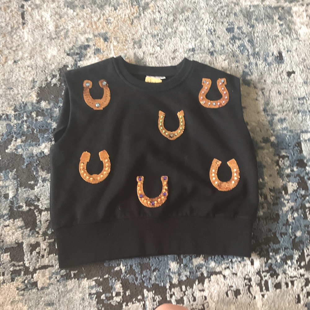 NWOT Queen of Sparkles black horseshoe shoulder pad tank size s